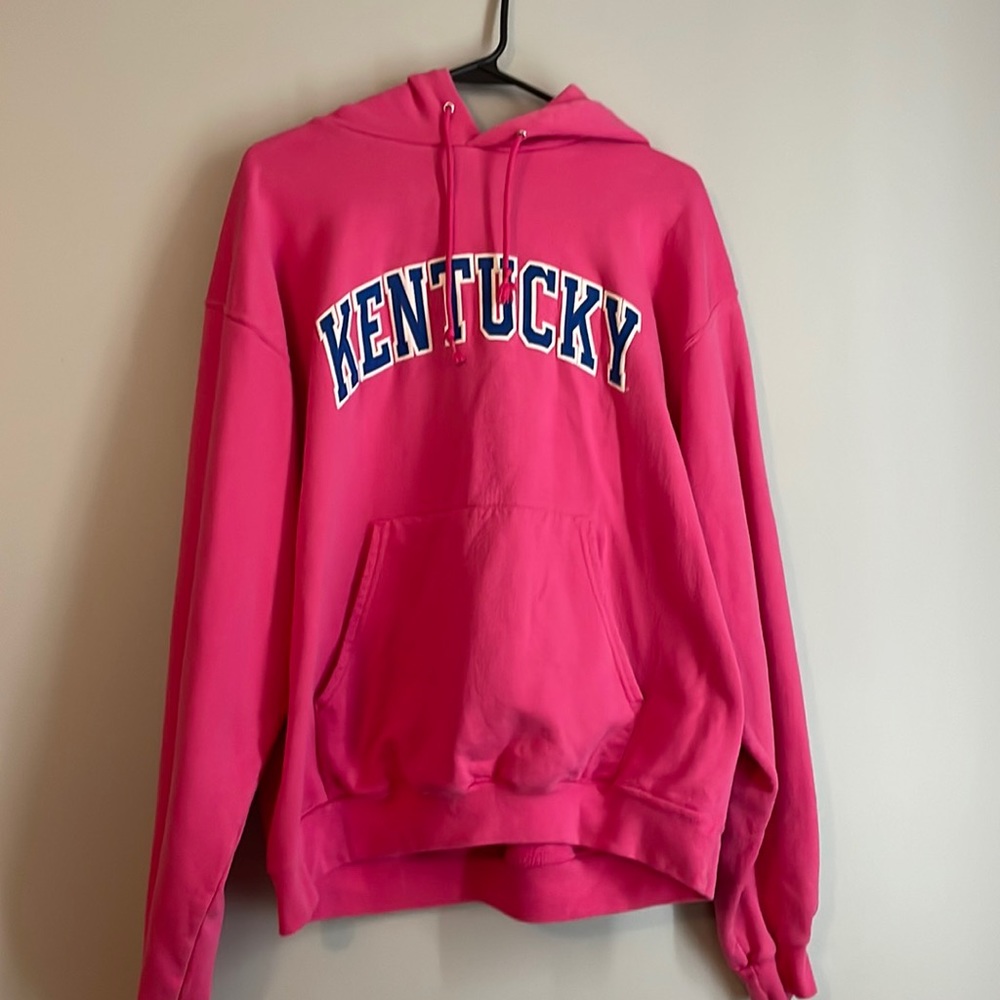Size large pink University of Kentucky sweatshirt with hood.